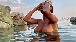 is monika fox naked in that beautiful place, teasing her big tits with a tattoo on display while masturbating solo?