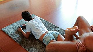 Gamer girl plays NFS while giving footjob 😏