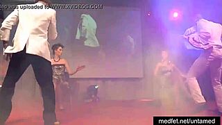 Male strippers flaunt huge cocks to eager ladies on stage