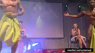 Male strippers flaunt huge cocks to eager ladies on stage