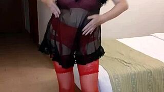 milf strips in lingerie, plays with dildo