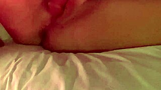 She indulges in self-pleasure, exploring her body with gentle touches and building excitement in a private moment.