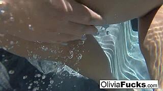 horny olivia masturbates her pussy underwater in nude solo scene