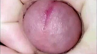 Young amateur masturbates at home with cock in hand