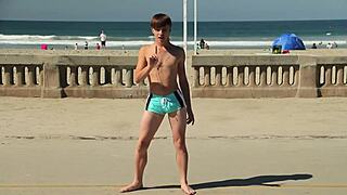 Twink Dancing on Beach with Speedo Bulge Showing Off Novinho Moves in Sunga.