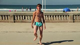 Twink Dancing on Beach with Speedo Bulge Showing Off Novinho Moves in Sunga.