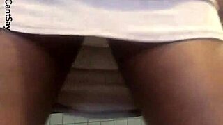 Peeking Under Her Skirt At Ebony Pussy