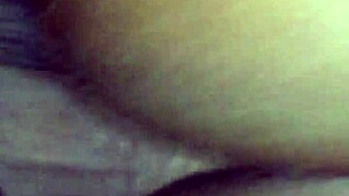 Ebony woman bent over in doggystyle position taking black cock