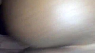 Ebony woman bent over in doggystyle position taking black cock