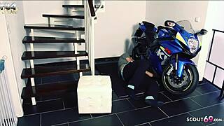 German milf seduces young teen in stairwell for sex.