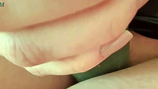 Mature woman uses cucumber for pleasure