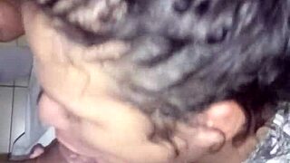 A shemale gives oral to a big black cock in this detailed scene with sensual touches and deep throating