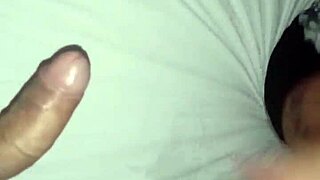 A shemale gives oral to a big black cock in this detailed scene with sensual touches and deep throating