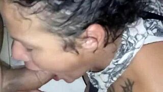 A shemale gives oral to a big black cock in this detailed scene with sensual touches and deep throating