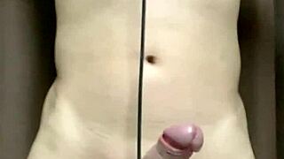 wow, this japanese guy tying his penis and balls with string in hentai style