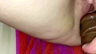 my gf playing with a big dildo