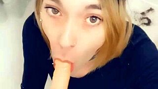 Sexy shemale loves sucking cock on her knees