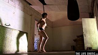 Athletic Brunette With Big Tits Gets Naked And Fingers Herself In Boxing Gym