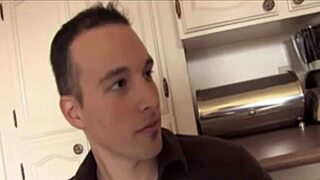 Interracial clothed woman gives naked man handjob in CFNM setting, clothes coming off