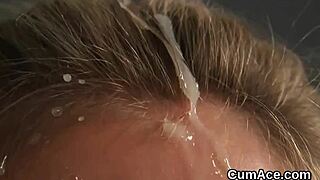 this wacky doll takes a huge cumshot, swallowing every drop on her face.