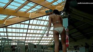 Watch Russian teen Alla swim naked, showing big tits and juicy ass.