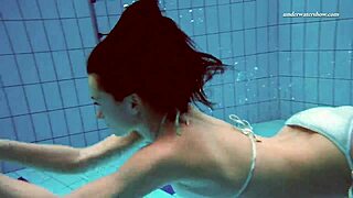 Watch Russian teen Alla swim naked, showing big tits and juicy ass.