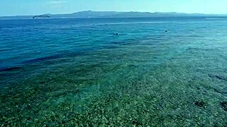 Drone captures bold exibitionism on nudist beach