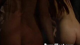 Two women in intimate group activity