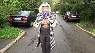 Nylon milf struts with big transparent boobs in sexy walk