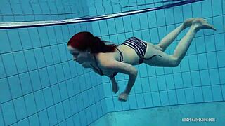 i watch redheaded katrin strip underwater in the pool