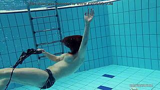 i watch redheaded katrin strip underwater in the pool