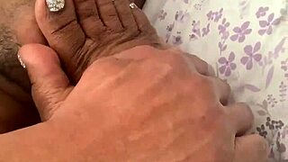 Wife sucks my cock while giving a handjob, focusing on feet and toes in fetish play.