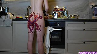 naked housewife with octopus tattoo cooks dinner in kitchen ignoring you