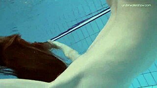 The Russian beauty, Anna Netrebko in a stripy swimsuit gives a small tit show