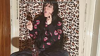 Skinny goth teen smokes cigarette backstage