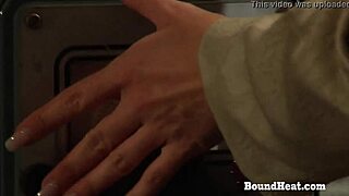 adela is chained up, obeying her mistress's femdom orders with electro play