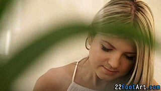 Petite babe gets cumshot on feet