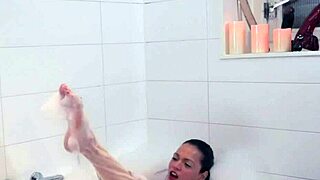 solo bathing shemale tugs in the bath