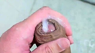 Enjoying a pleasurable cum in the shower, what a contrast to daily routine