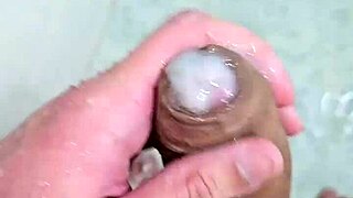 Enjoying a pleasurable cum in the shower, what a contrast to daily routine