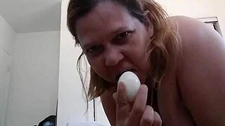 Princess Danyza sucks egg with big tits