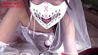 Beautiful teen in wedding cosplay uses toys for intense session.