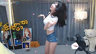 Korean cutie dances seductively on magic phone call