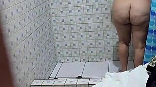 Amateur shower scene with mature Venezuelan neighbor in the background