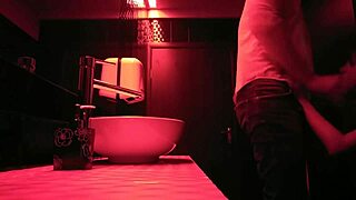 couple enjoys intimate moment in bathroom