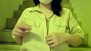 Bold Asian Milf Masturbates Wildly on Stairs!