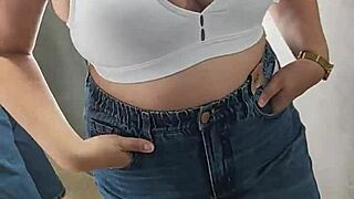 in the store's dressing room with ass plugged!