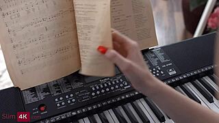 Slim red-haired teen in doggystyle position