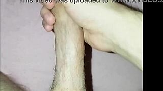 Watch this young guy masturbate his cock!