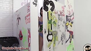the ho eagerly sucks through the gloryhole, getting a massive bukkake